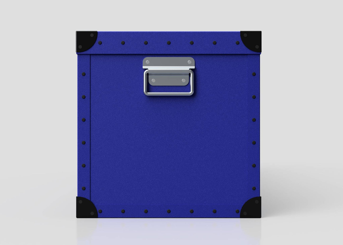 The Cricket Storage Poly Case (Large) is a square blue polyethylene box with black corner protectors, metal studs, and a zinc drop handle on the front, shown against a plain white background.