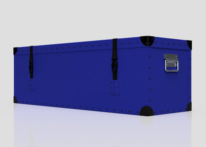 The Cricket Storage Poly Case (Medium) is a blue rectangular polyethylene box featuring black corner protectors, zinc drop handles, and two black webbing straps, displayed against a plain white background.