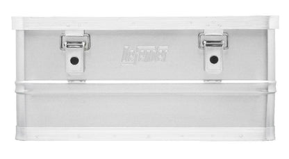 The Defender KA44-017 is a rectangular, silver, stackable storage box with two front latches and an embossed Defender logo on the center front, crafted from lightweight aluminium.