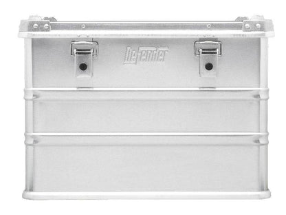 The Defender KA64-005 is a 73-litre silver metal case with two front latches, a ribbed reinforced structure, flat lid, “Defender” embossed in the center, and can be fitted with a custom foam interior for extra protection.