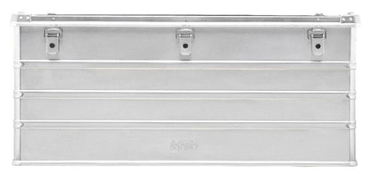 The Defender KA64-012 is a rectangular silver metal storage box with three lid latches, front horizontal ridges, and a custom routed foam interior for secure organization.