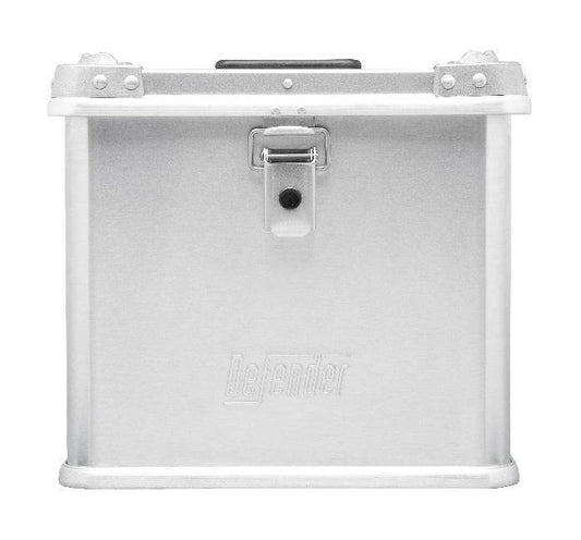 The Defender KA74-001 is a square, silver metal 27L case with a front latch and "Defender" embossed on the side.