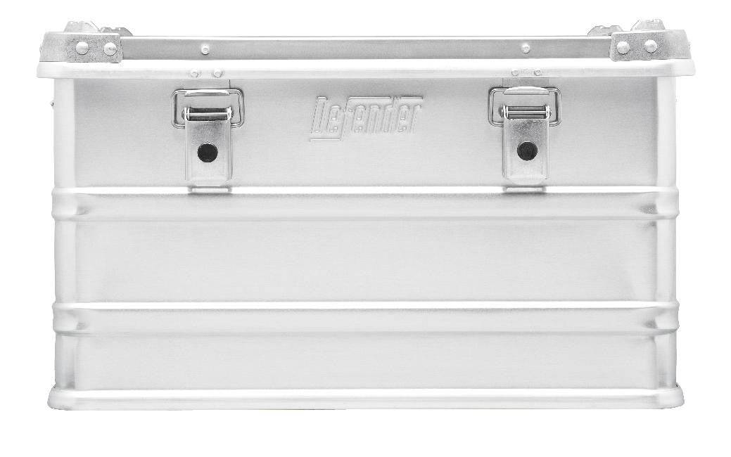 The Defender KA74-004 is a rectangular silver metal storage box with two front latches, a raised center logo, and a custom routed foam interior for secure organization.