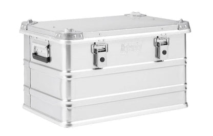 The Defender KA74-004 is a rectangular silver metal storage box with side handles, two front latches, and a 60-litre capacity, shown against a white background.