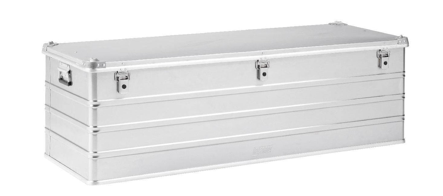 The Defender KA74-013 is a rectangular silver metal case with screen print, three front latches, side handles, and a custom routed foam interior, shown on a white background.