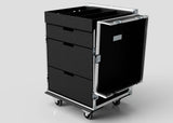 The Dressing Room & Pitchside Medical Case | Mobile First Aid Trolley is a black rolling cart with three drawers, an open door, metal edges, and four caster wheels—perfect for sports medicine storage—shown on a light gray background.