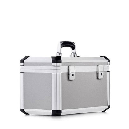 The Exclusive 93500 is a small, rectangular silver aluminium frame case with black reinforced corners, an ergonomic top handle, and two front latches, shown against a white background.