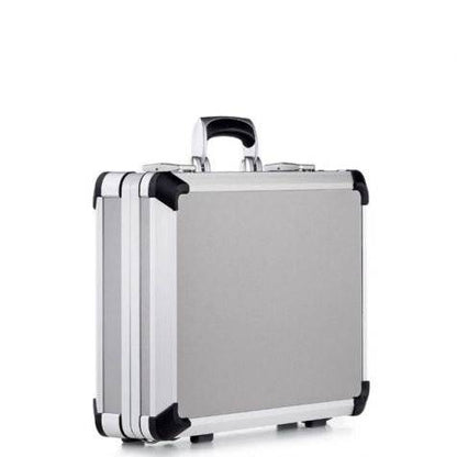 The Exclusive 93700 is a silver aluminium frame case with black corner protectors and a handle, standing upright on a white background and featuring custom CNC foam fittings for superior protection.