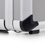 Close-up of the Exclusive 93700 aluminium frame case corner featuring a black protective plastic bumper and a small black foot on a flat surface.