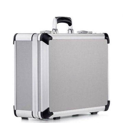 The Exclusive 93900 (460 x 340 x 174) is a silver aluminium frame case with a black handle and reinforced black corners, standing upright on a white background, featuring AEX design and high carrying comfort.