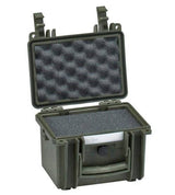 The Explorer 1913, a rugged, dark green corrosion-proof case with a custom foam interior, is open, revealing its latch, handle, and a securely stored item inside.