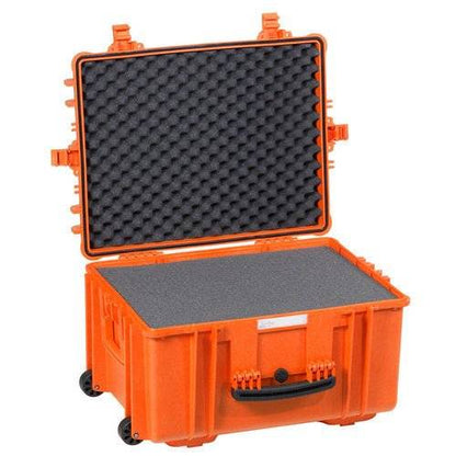 The Explorer 5833 is an open orange waterproof case with a custom foam interior, black handle, wheels, and secure clasps, designed for safely transporting equipment.
