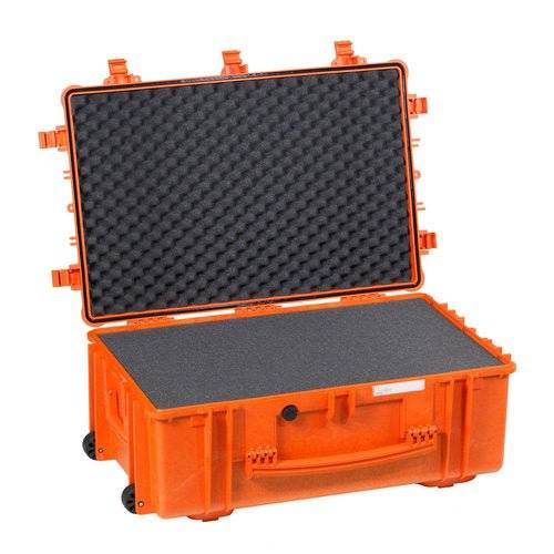 The Explorer 7630 is an open, orange, hard plastic waterproof case with customizable foam inside, standing on its wheels with the lid raised.