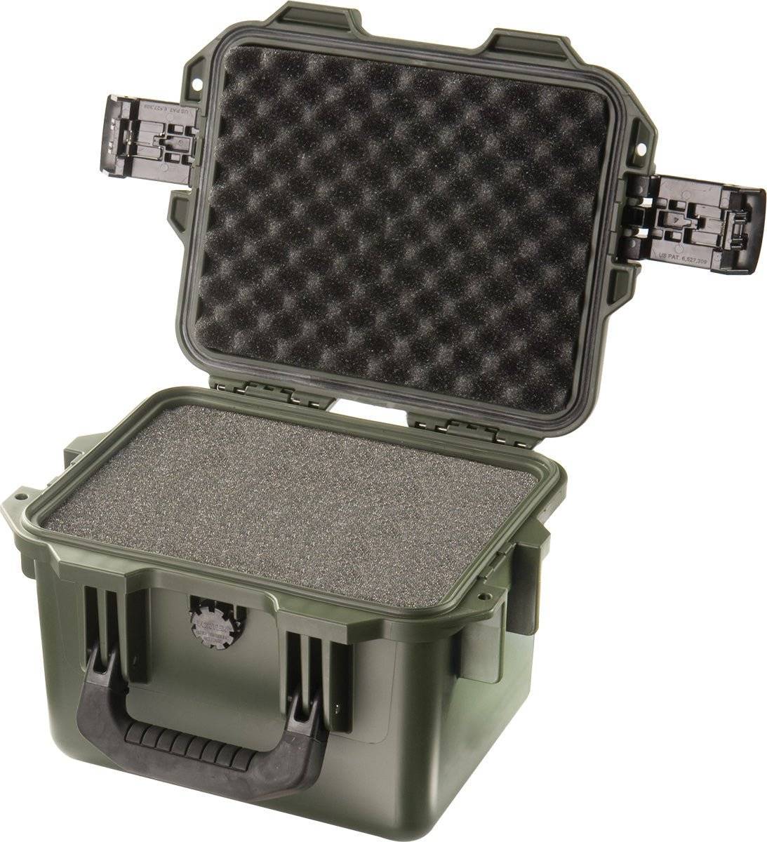 A green iM2075 Storm Case with a hard plastic shell and open lid reveals foam padding inside. This crushproof case keeps your items protected.