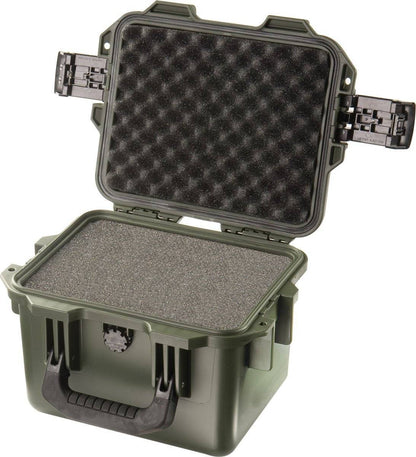 A green iM2075 Storm Case with a hard plastic shell and open lid reveals foam padding inside. This crushproof case keeps your items protected.