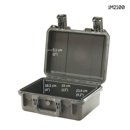 The iM2100 Storm Case is shown open with measurements: 5.1 cm height, 10.2 cm depth, 33 cm width, and 23.4 cm length. This watertight case has two latches and a handle for secure transport.
