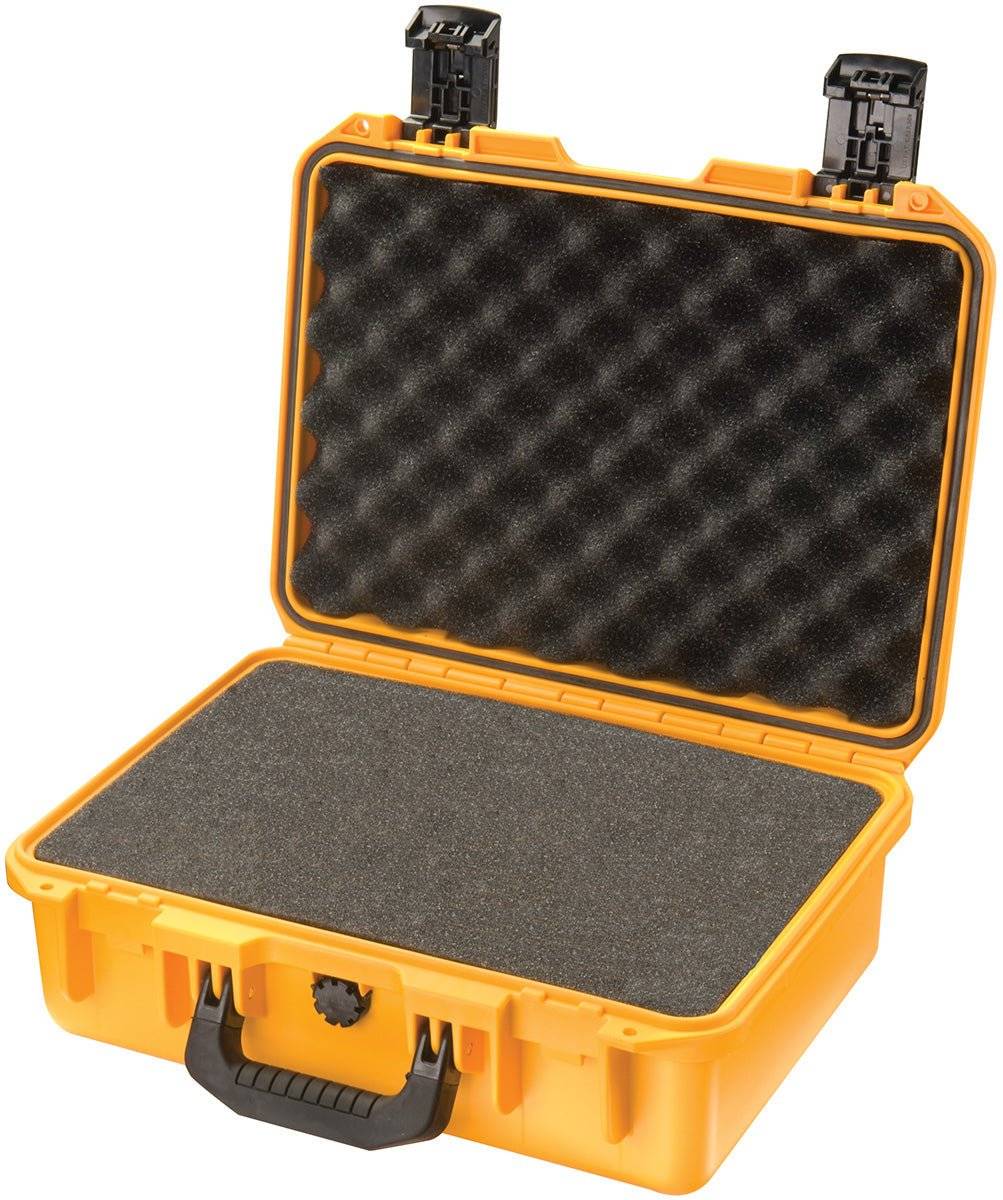 An open, yellow iM2200 Storm Case with black handles and latches reveals foam padding in the lid and base, offering protective, watertight storage.
