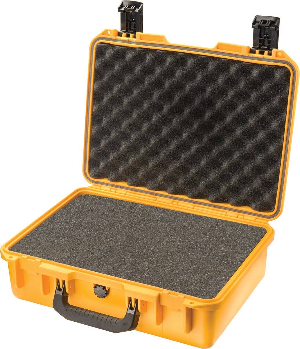 An open yellow iM2300 Storm Case with black egg-crate foam in the lid and flat foam in the base. This watertight case reliably protects your valuable gear with its secure, padded interior.