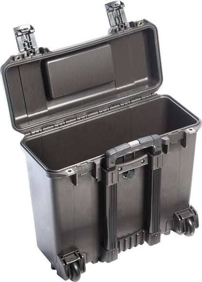 The iM2435 Storm Top Loader Case features a hard plastic build with an open lid, empty interior, two latches, two wheels, and a retractable handle—making it a crushproof case for reliable protection.