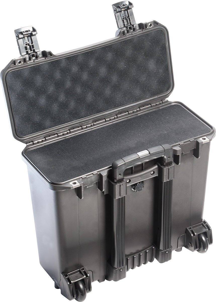 The iM2435 Storm Top Loader Case is a black, hard-shell PELI Storm Case with foam interior, two latches, wheels, and a handle—crushproof and watertight for durable gear protection, shown open and upright.