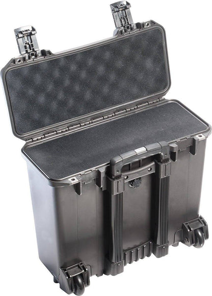 The iM2435 Storm Top Loader Case is a black, hard-shell PELI Storm Case with foam interior, two latches, wheels, and a handle—crushproof and watertight for durable gear protection, shown open and upright.