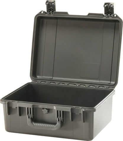 A black iM2450 Storm Case hard plastic carrying case with an open lid shows an empty interior and two latches on top. This crushproof PELI case provides reliable protection for your valuables.