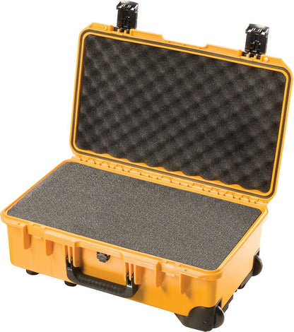 The iM2500 Storm Carry-On Case is an open yellow PELI Storm Case with foam padding inside, designed to safely store and transport equipment while being crushproof.