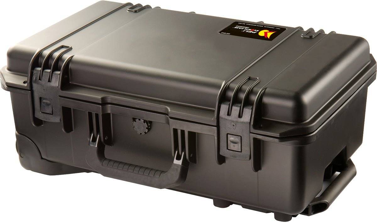 The black iM2500 Storm Carry-On Case features double latches, a sturdy handle, and a small label on the top right corner. This crushproof case offers reliable protection for your valuables.