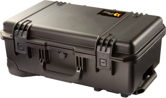 The black iM2500 Storm Carry-On Case features double latches, a sturdy handle, and a small label on the top right corner. This crushproof case offers reliable protection for your valuables.