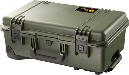 A closed, green iM2500 Storm Carry-On Case with black latches, handle, and a small ID label on the top right offers crushproof protection for your gear.