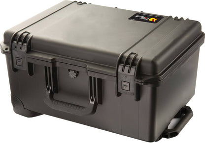 The iM2620 Storm Travel Case is crushproof and made of hard plastic, featuring secure latches, a carry handle, and a top lid label for reliable gear protection.