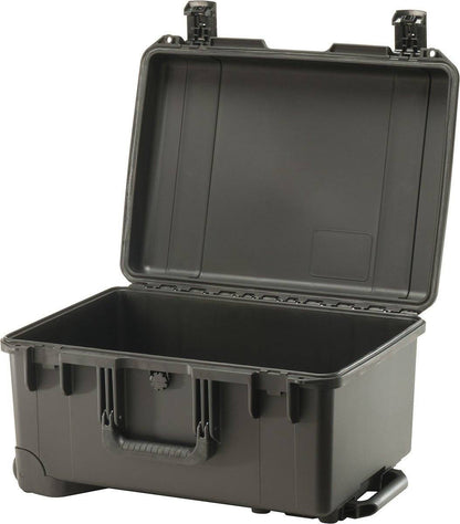 The iM2620 Storm Travel Case is shown open in black, highlighting its hard plastic, crushproof, and watertight design with an empty interior and a front handle for easy carrying.