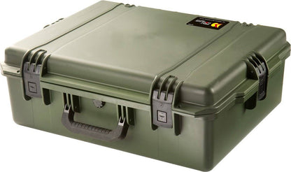 A closed, olive green iM2700 Storm Case with black latches, a handle, and a small label on the top right corner. This watertight case keeps your gear safe and protected.