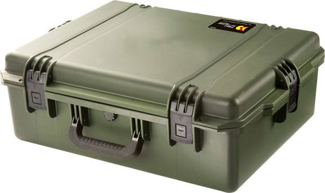 A closed, olive green iM2700 Storm Case with black latches, a handle, and a small label on the top right corner. This watertight case keeps your gear safe and protected.