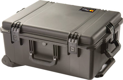 A hard, black iM2720 Storm Travel Case with custom CNC foam, a secure Press and Pull latch, handle, and small label on the top corner.
