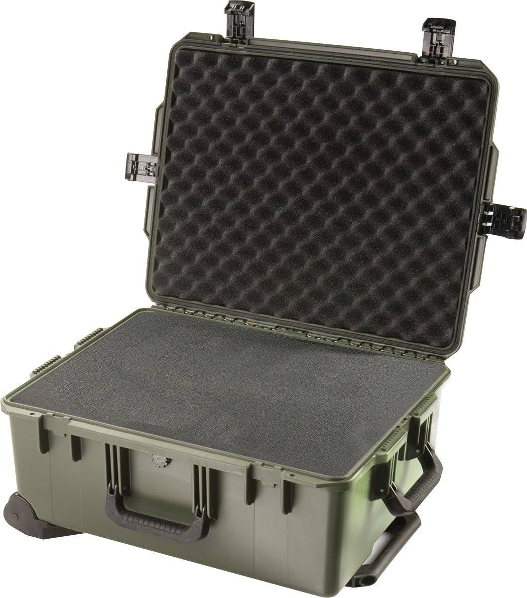 The iM2720 Storm Travel Case is a green hard-shell PELI case with an open lid, featuring foam padding and custom CNC-fit foam on the top and bottom interiors.