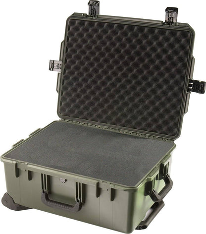The iM2720 Storm Travel Case is a green hard-shell PELI case with an open lid, featuring foam padding and custom CNC-fit foam on the top and bottom interiors.