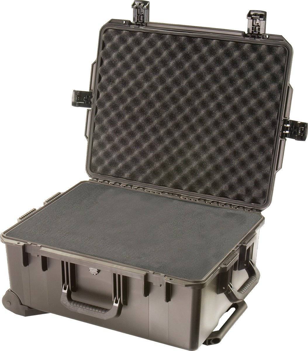 The iM2720 Storm Travel Case, shown open with the lid upright and custom CNC foam fittings, features a hard-shell exterior and secure Press and Pull latch for safe equipment storage and transport.