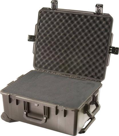 The iM2720 Storm Travel Case, shown open with the lid upright and custom CNC foam fittings, features a hard-shell exterior and secure Press and Pull latch for safe equipment storage and transport.
