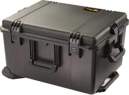The iM2750 Storm Travel Case is large and sturdy, with a black hard-shell exterior, secure latches, a carrying handle, custom foam interior fittings, and a lid label.