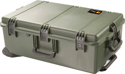 The iM2950 Storm Travel Case is a large, sturdy green case with black handles, secure latches, custom CNC foam inserts, and a small lid label, providing ultimate protection for your gear.