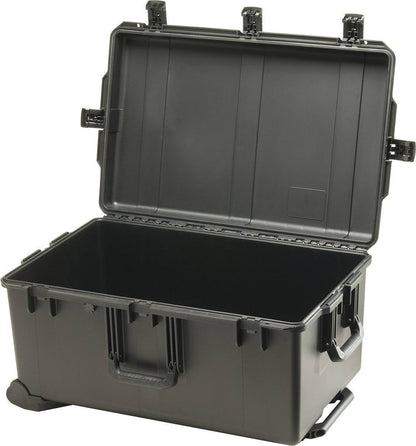 The iM2975 Storm Travel Case is a large, hard plastic black case with a hinged lid, side handles, and secure Press and Pull latches—perfect for custom CNC foam fittings.