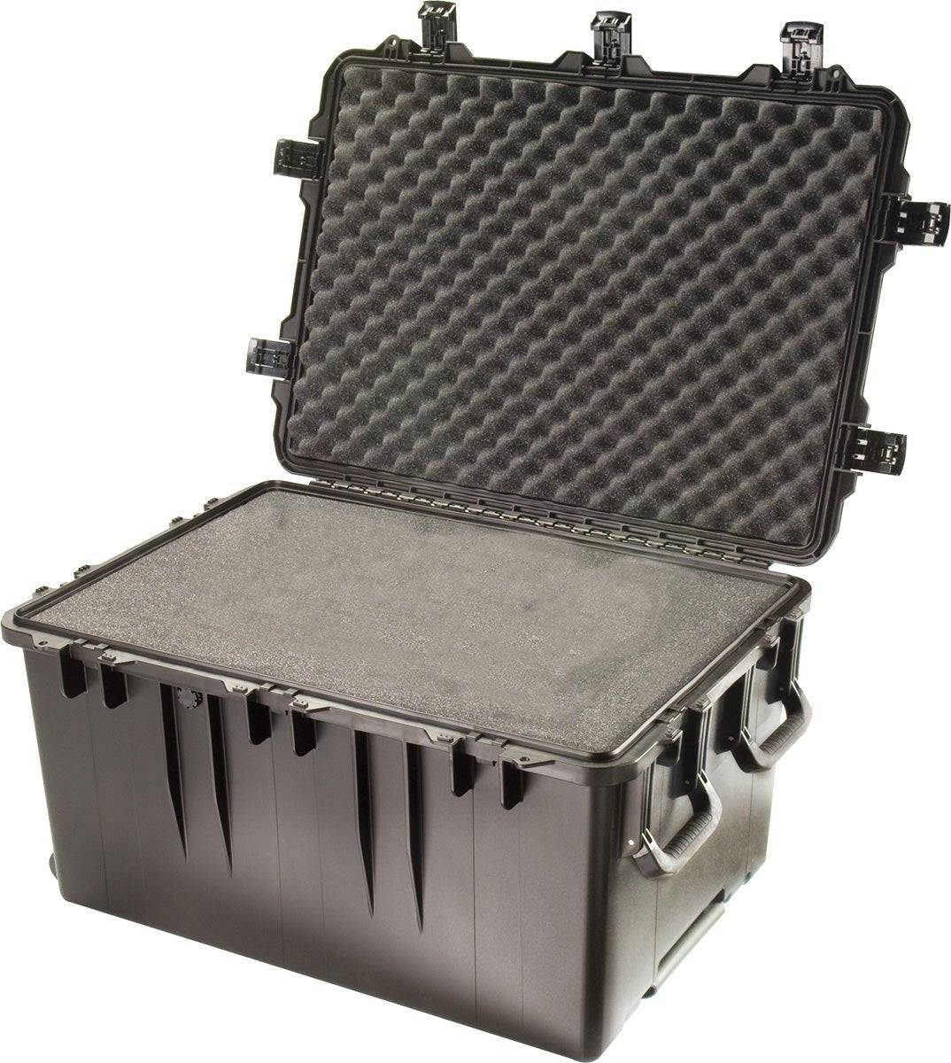 The iM3075 Storm Transport Case is a large, hard plastic PELI case with an open hinged lid, custom CNC foam inserts, Press and Pull latch, and side carrying handles for secure, reliable protection.