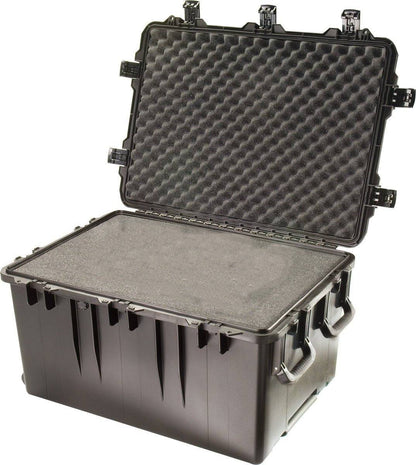 The iM3075 Storm Transport Case is a large, hard plastic PELI case with an open hinged lid, custom CNC foam inserts, Press and Pull latch, and side carrying handles for secure, reliable protection.