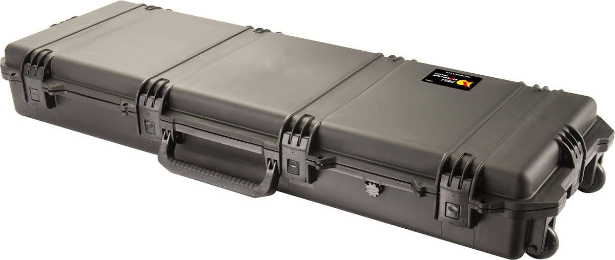 The iM3200 Storm Long Case is a large black case made from HPX Resin, featuring Press and Pull latches, a handle, wheels, and a label on one side for easy identification and secure storage.