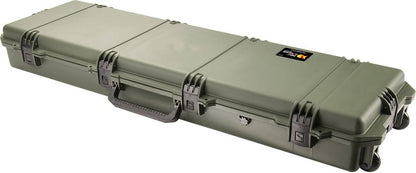 The iM3300 Storm Long Case, a large green case made from durable HPX Resin with wheels, a handle, and secure Press & Pull latches, is shown on a white background.