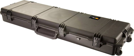 The iM3300 Storm Long Case is a large, black case made from rugged HPX Resin, with reinforced corners, three Press and Pull latches, a side handle, and a small label on top.