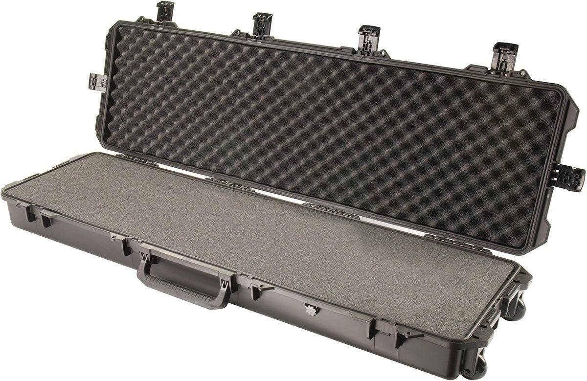 The iM3300 Storm Long Case is a hard-shell black PELI case with foam interior, shown open and empty, ideal for securely transporting long items like equipment or instruments. It features a reliable Press and Pull latch.
