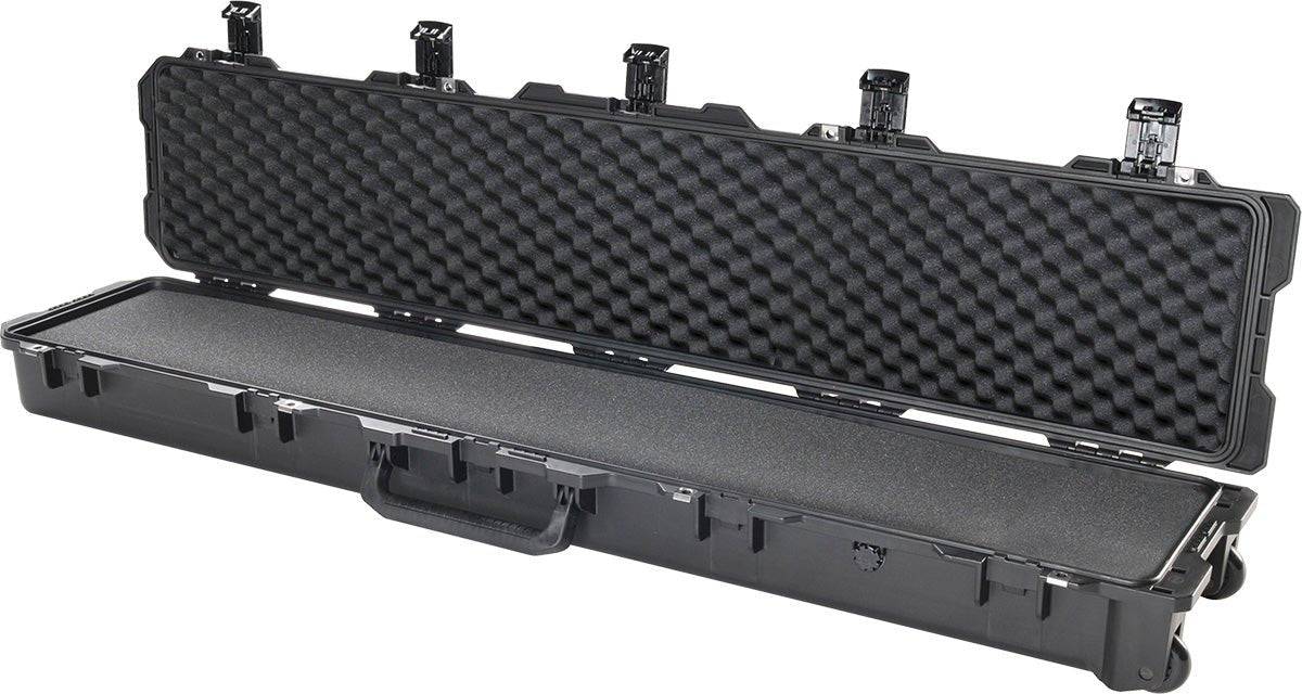 An open iM3410 Storm Long Case in black, made with HPX Resin, displays foam padding, sturdy Press and Pull latches on the lid, and a front handle.
