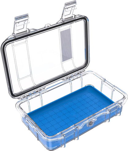 The M50 PELI Micro™ Case is a clear plastic, crushproof protective case with a blue base, hinged lid, and secure lock. It offers reliable IP67 protection for your valuables and is shown open and empty.